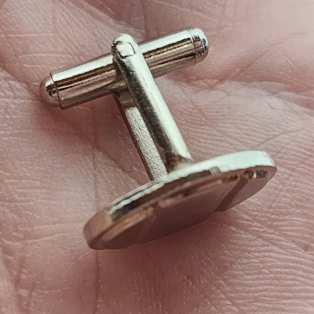 Source Unknown minimalist silver